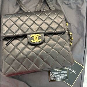 Vintage CHANEL Black Quilted Backpack with 24K gold plated hardware